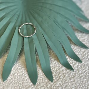 Small rope stackable ring band in sterling silver.
