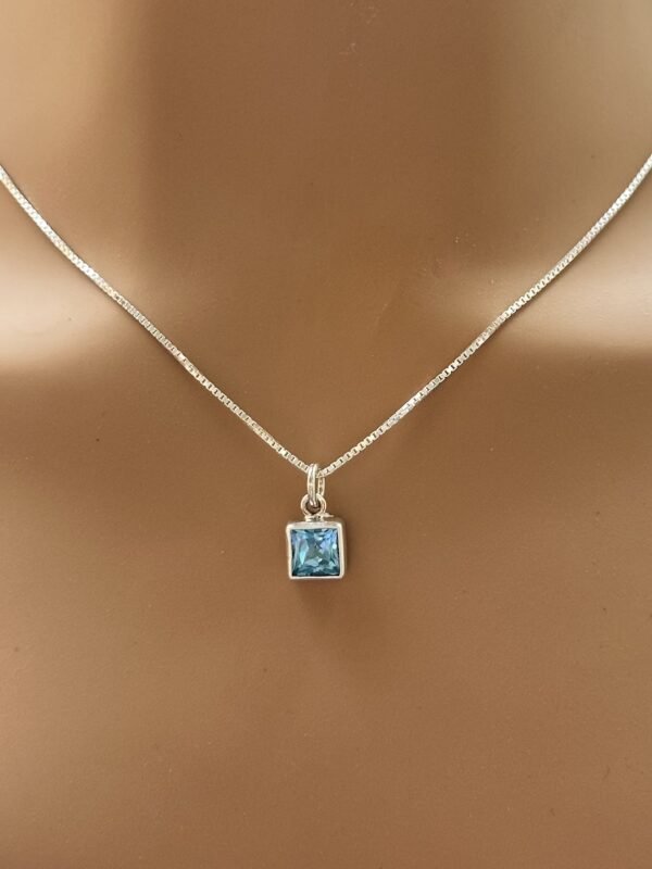 Delicate Blue Topaz Pendant